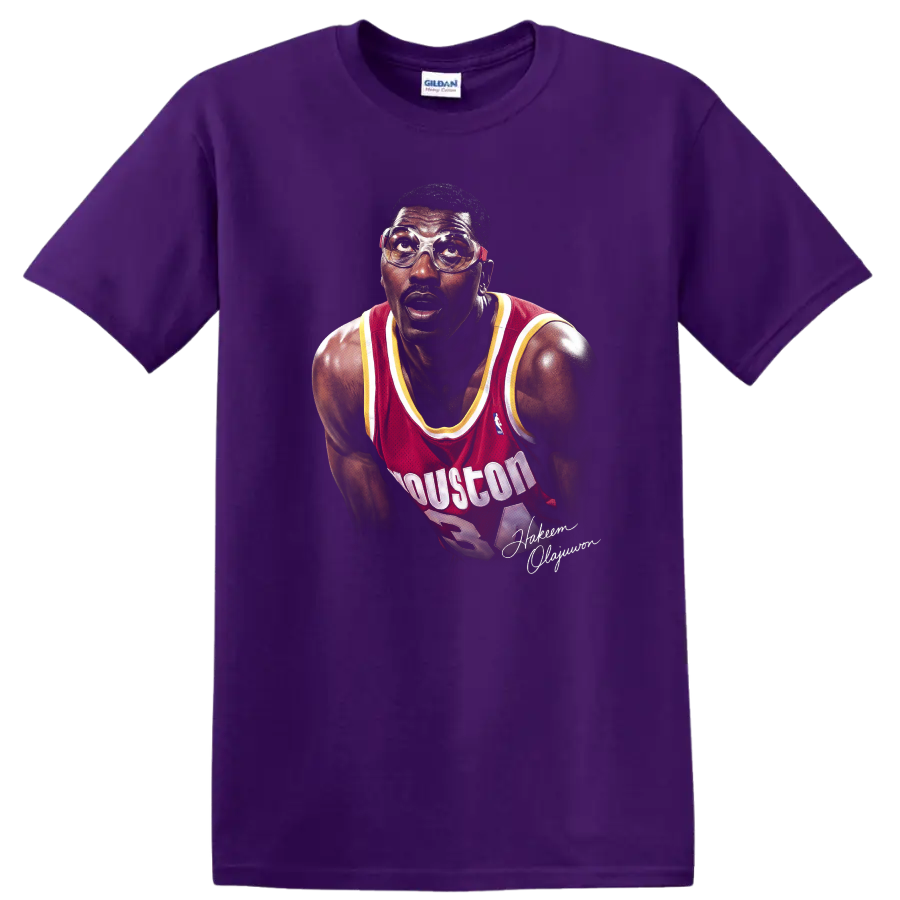 Hakeem Olajuwon Houston Rockets portrait in red jersey and protective goggles on a Purple T Shirt