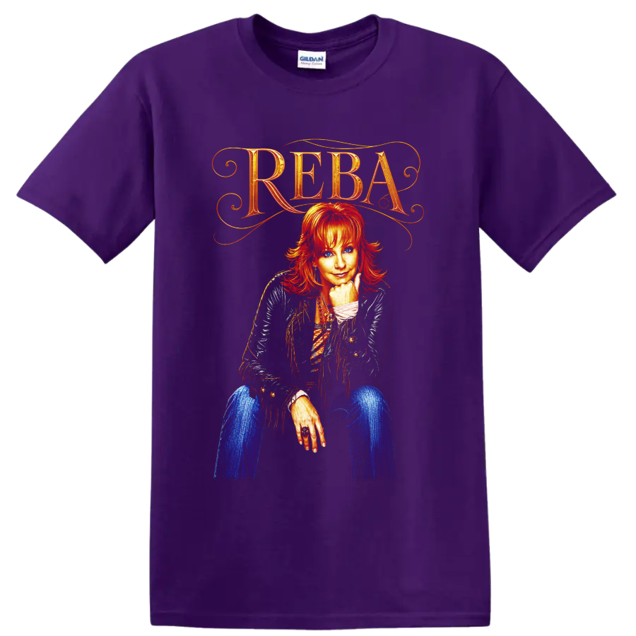 Reba McEntire portrait with ornate REBA lettering, fringe jacket, and vivid western art on a Purple T Shirt