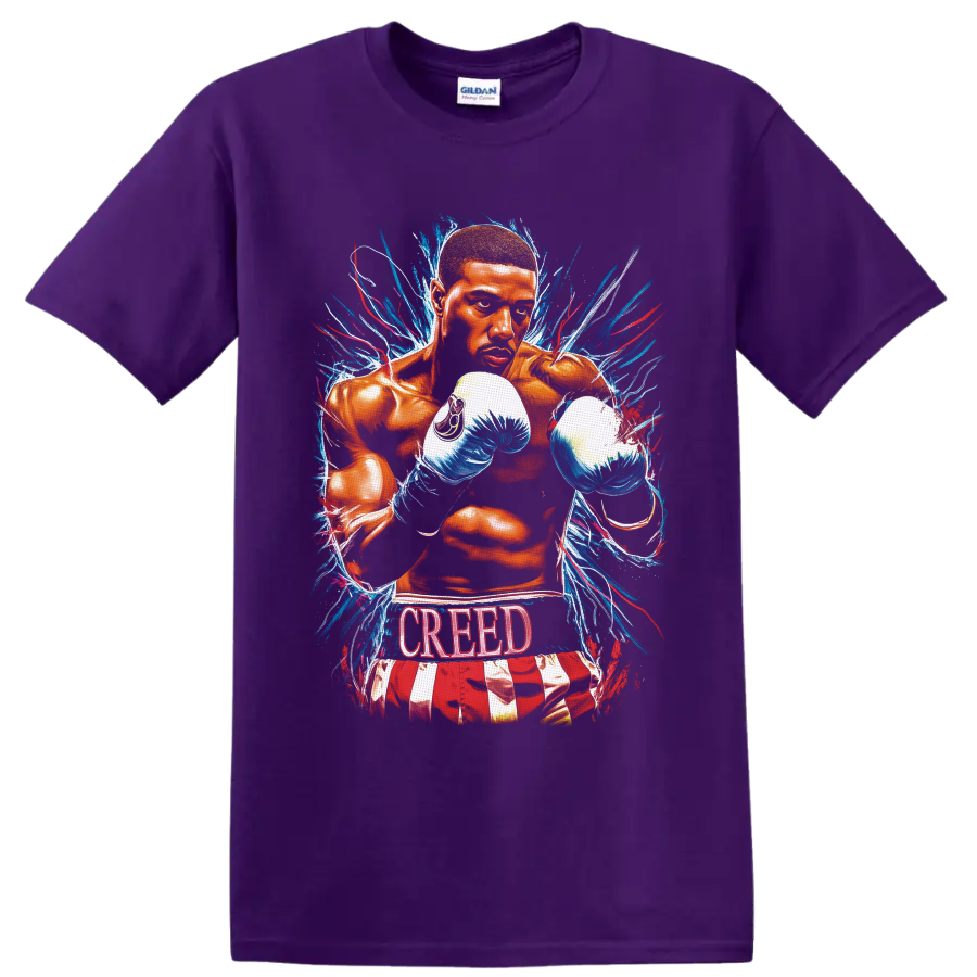 Adonis Creed boxing illustration with blue gloves, paint bursts, and CREED text on a Purple T Shirt