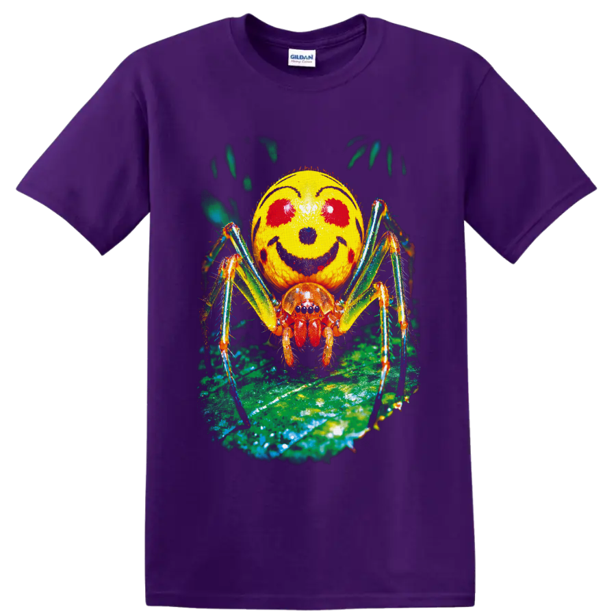 Colorful macro Smiley Face Spider with yellow marked abdomen on a green leaf on a Purple T Shirt
