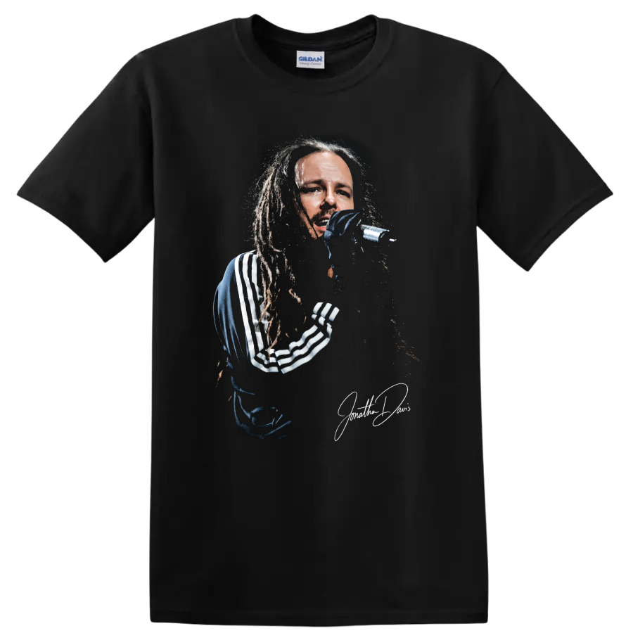 Jonathan Davis of Korn performing with a microphone in gritty portrait artwork on a Black T Shirt
