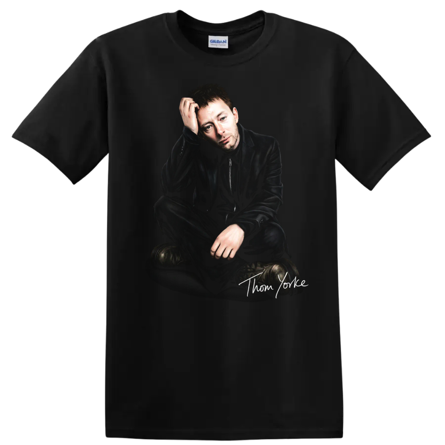 Thom Yorke seated portrait with handwritten signature, dark alternative rock style on a Black T Shirt