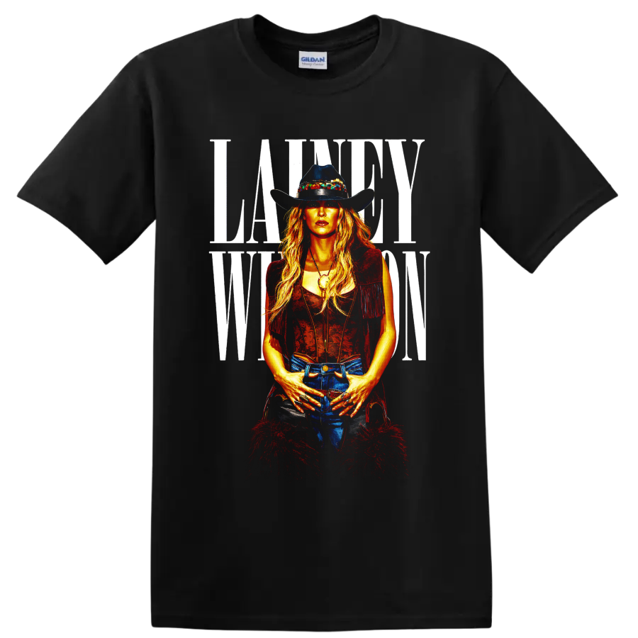 Lainey Wilson western portrait in cowboy hat, fringe vest, and bold white lettering on a Black T Shirt