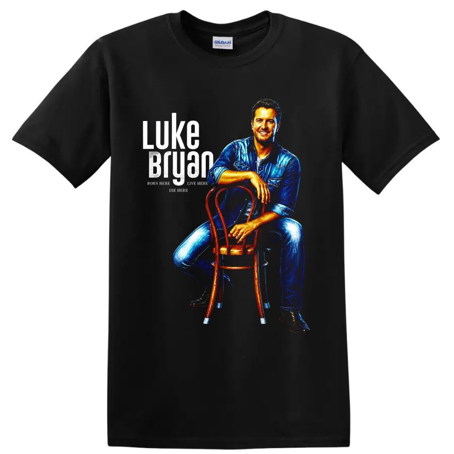 Luke Bryan portrait in blue denim seated on a wooden chair with distressed lettering on a Black T Shirt