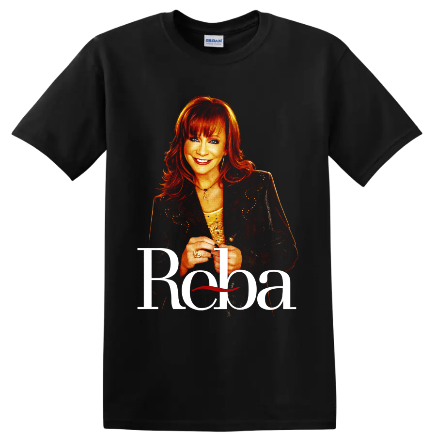 Reba McEntire portrait with red hair, sparkling jacket, and large Reba lettering on a Black T Shirt