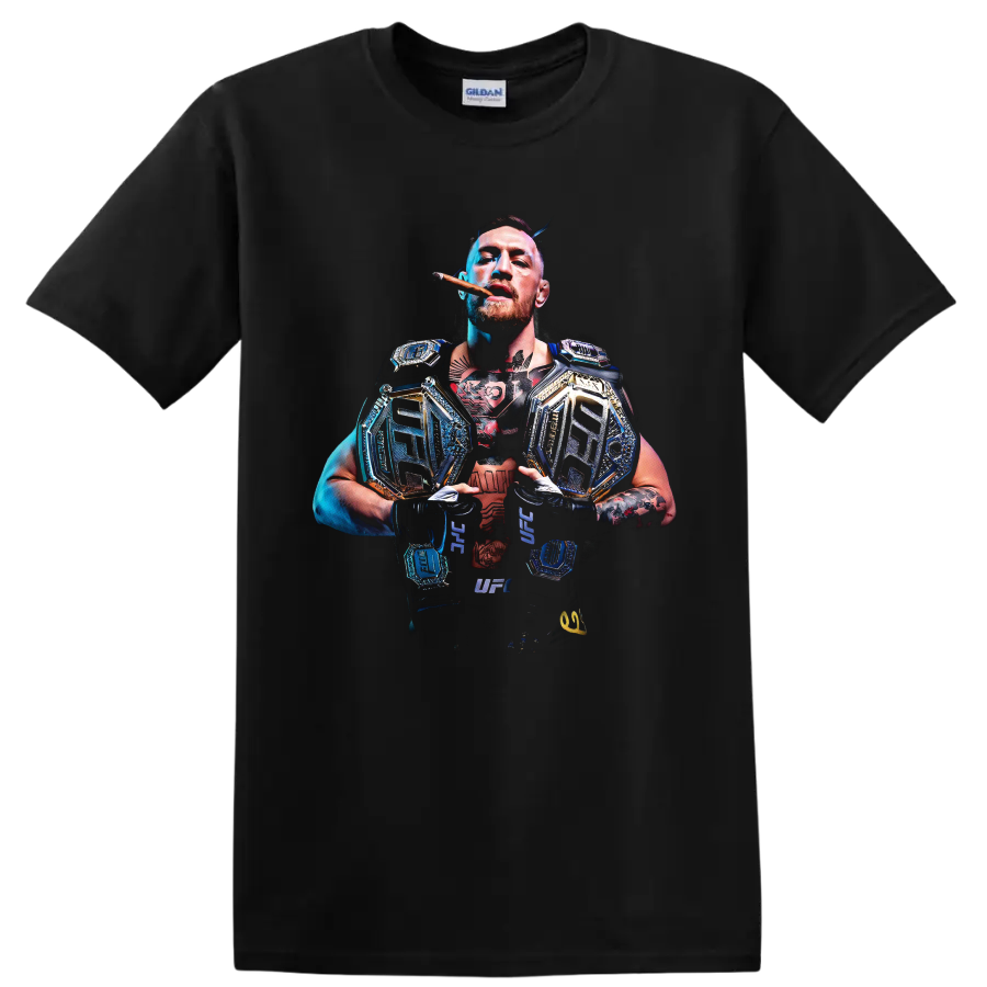 Conor McGregor with championship belts in a dramatic blue-and-gold MMA portrait on a Black T Shirt