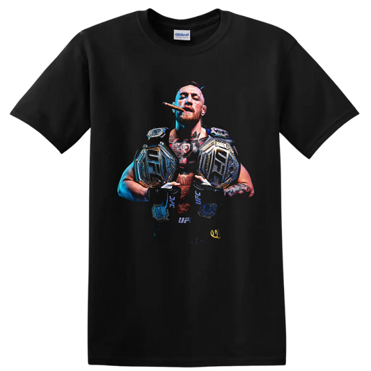 Conor McGregor with championship belts in a dramatic blue-and-gold MMA portrait on a Black T Shirt