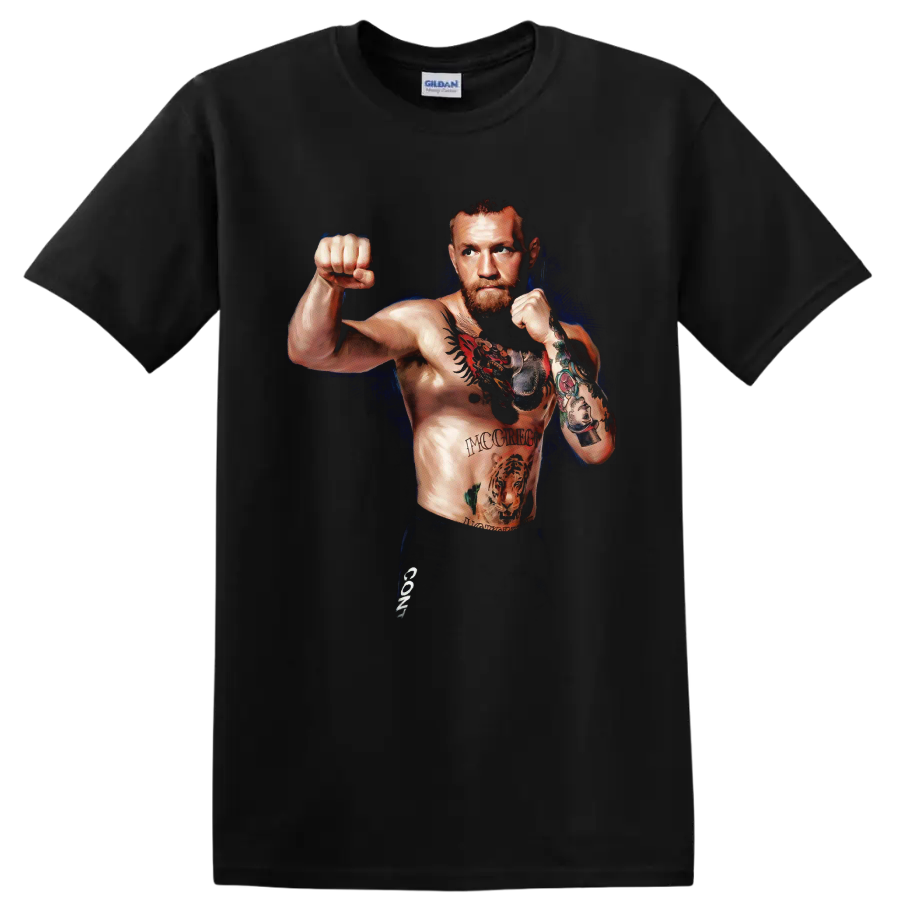 Conor McGregor in a tattooed fighting stance with a deep blue painterly backdrop on a Black T Shirt