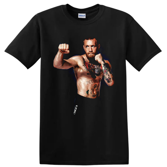 Conor McGregor in a tattooed fighting stance with a deep blue painterly backdrop on a Black T Shirt