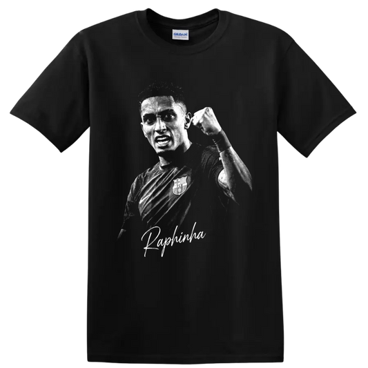 Raphinha raised-fist grayscale soccer portrait with signature-style name lettering on a Black T Shirt