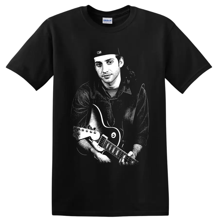 High-contrast monochrome portrait of Stone Gossard playing guitar on a Black T Shirt
