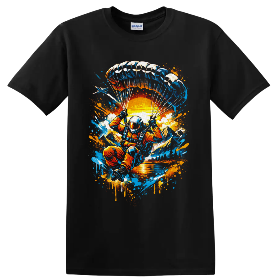 Skydiver under parachute over sunset mountains in vibrant graffiti splatter art on a Black T Shirt