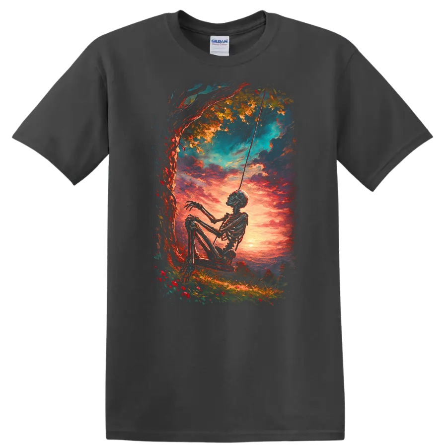 Vintage gothic skeleton on a swing beneath a tree at a vivid sunset on a Charcoal T Shirt