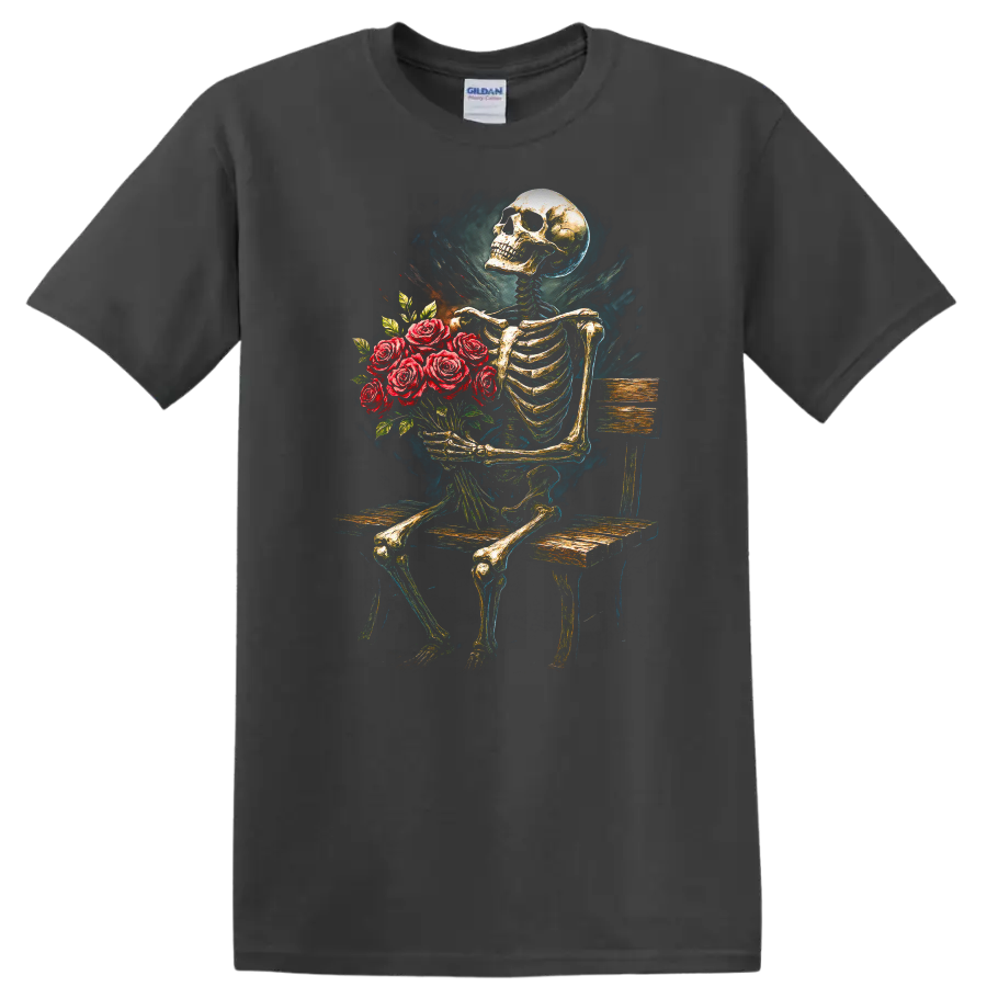 Vintage gothic skeleton holding a bouquet of red roses while seated on a wooden bench on a Charcoal T Shirt