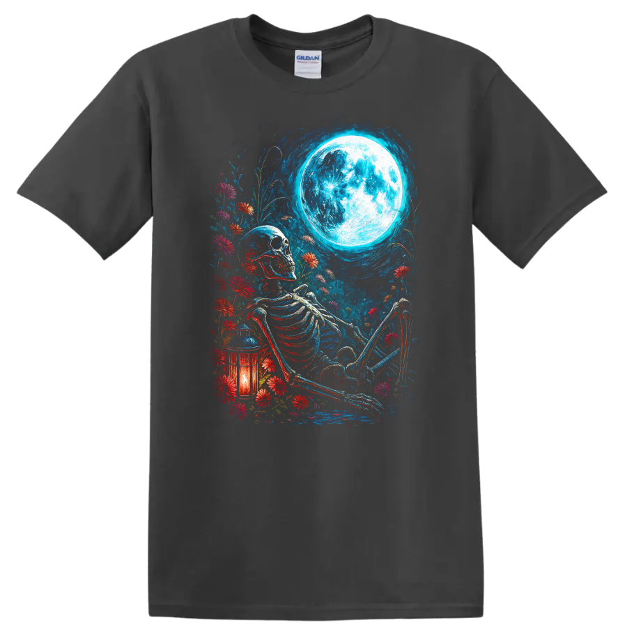 Vintage gothic skeleton resting among wildflowers beneath a full moon with lantern on a Charcoal T Shirt