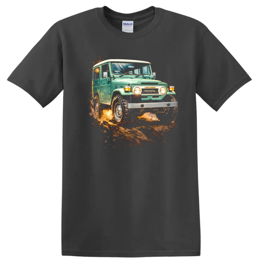 Vintage Toyota Land Cruiser J40 driving through dirt with off-road splash graphic print on a Charcoal T Shirt