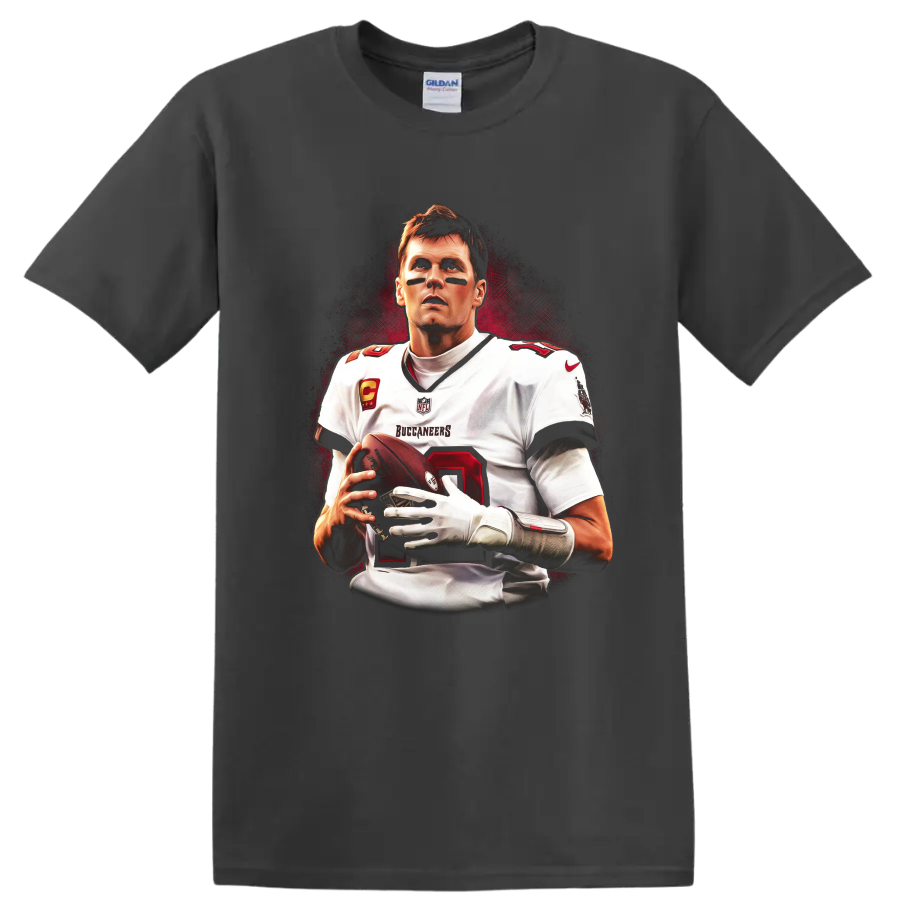 Tom Brady Buccaneers quarterback portrait with football and dramatic red backdrop on a Charcoal T Shirt