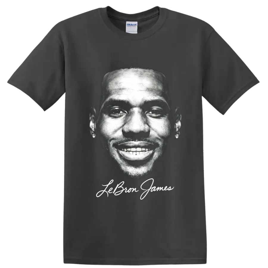 Monochrome LeBron James portrait with signature-style name lettering on a Charcoal T Shirt