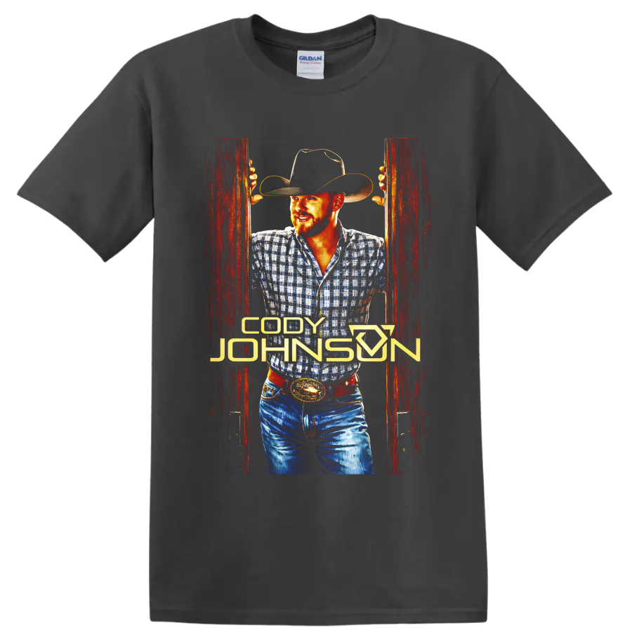 Cody Johnson cowboy portrait with black hat, plaid shirt, rustic red doors, and gold on a Charcoal T Shirt
