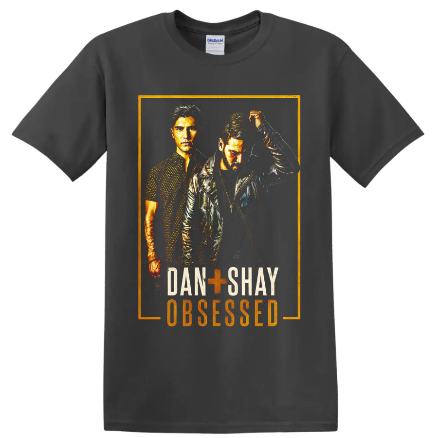 Dan + Shay duo portraits in distressed gold concert-poster art with Obsesssed text on a Charcoal T Shirt