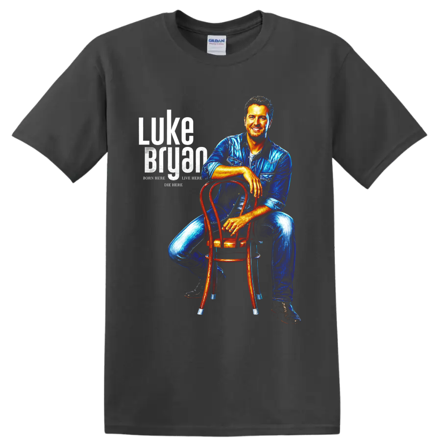 Luke Bryan portrait in blue denim seated on a wooden chair with distressed lettering on a Charcoal T Shirt