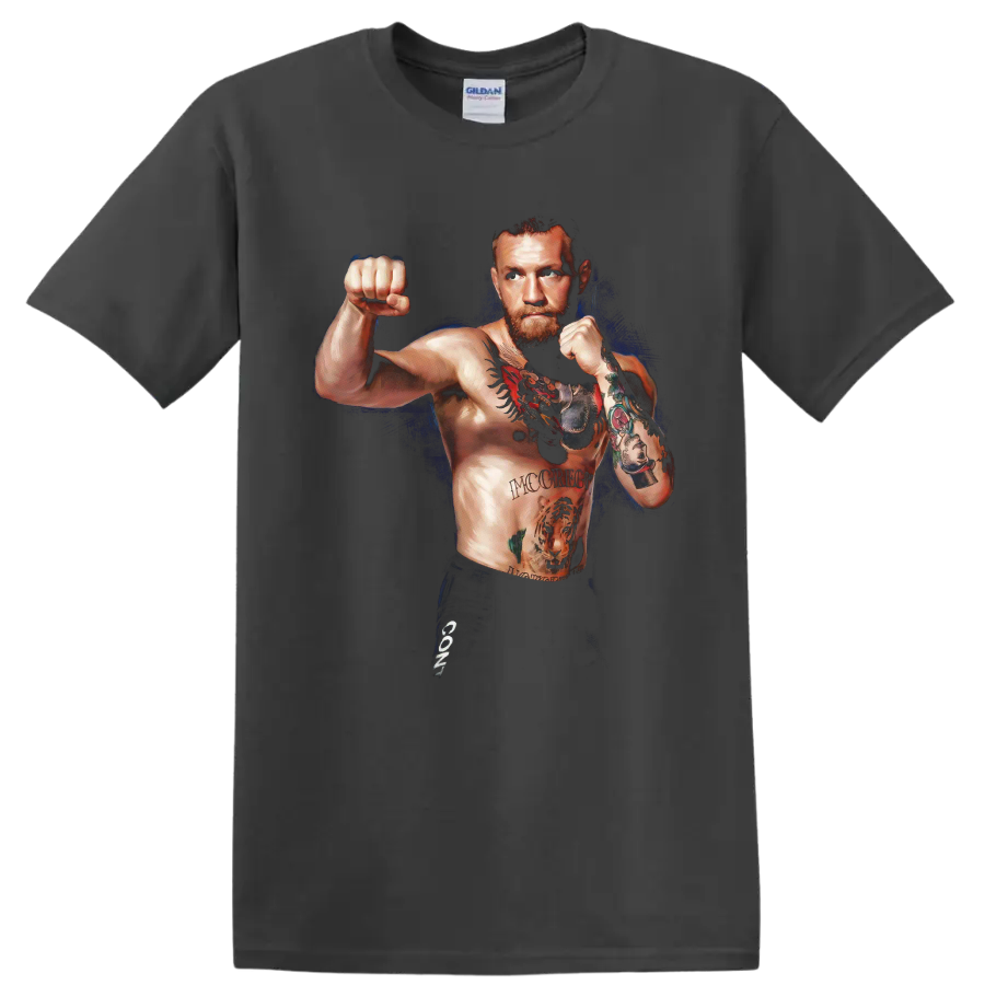 Conor McGregor in a tattooed fighting stance with a deep blue painterly backdrop on a Charcoal T Shirt