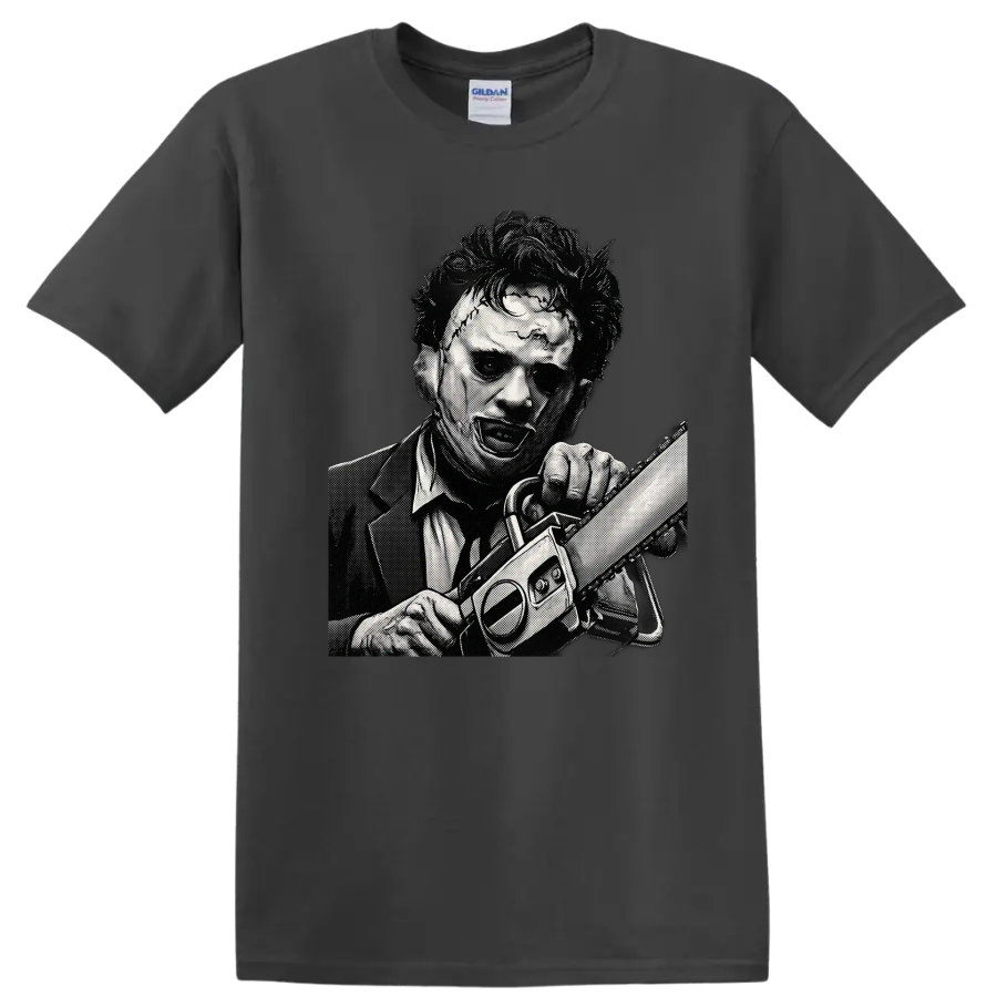 Leatherface wielding a chainsaw in black-and-white halftone horror art on a Charcoal T Shirt