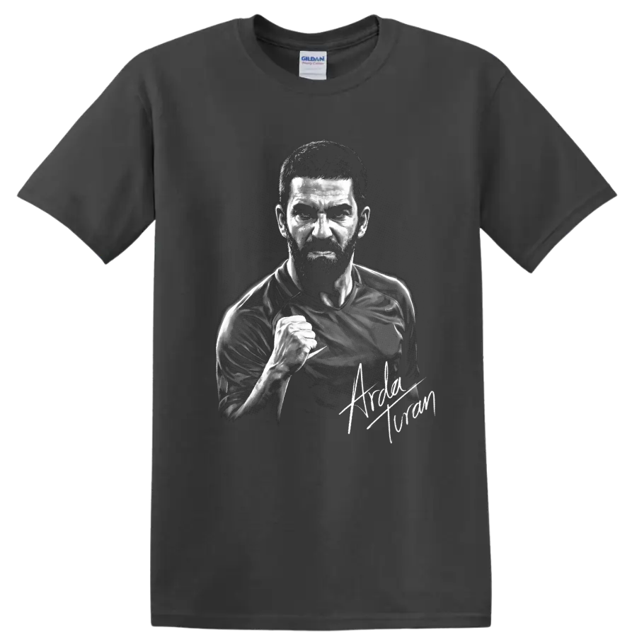 Arda Turan monochrome soccer portrait with raised fist and signature-style detail on a Charcoal T Shirt