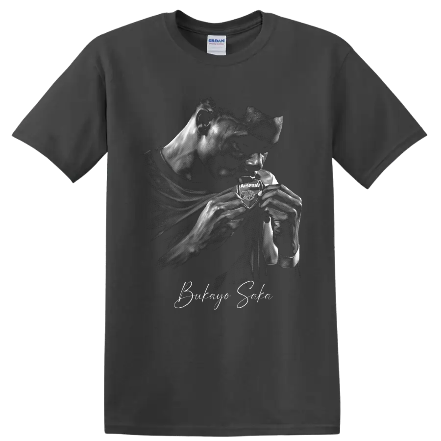 Bukayo Saka grayscale portrait kissing Arsenal crest with smoky effects and signature on a Charcoal T Shirt