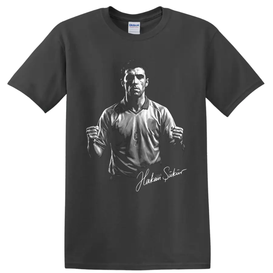 Hakan Şükür soccer striker portrait with number 9 jersey and signature-style text on a Charcoal T Shirt