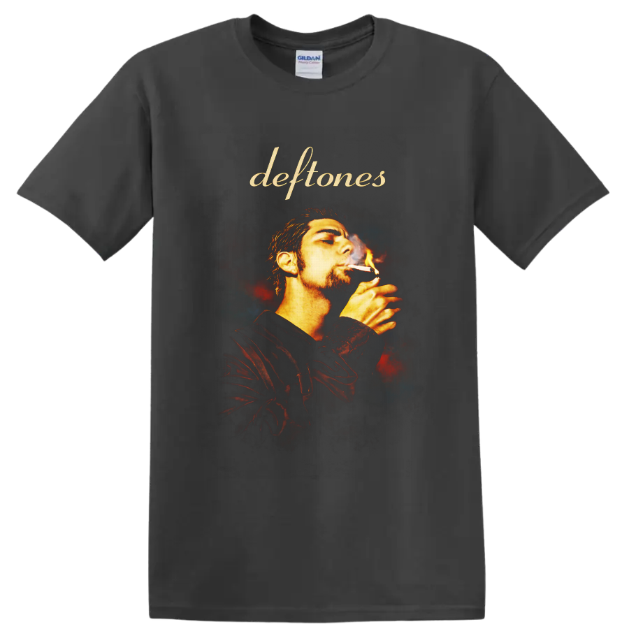 Deftones script above Chino Moreno smoking portrait with fiery smoky background on a Charcoal T Shirt
