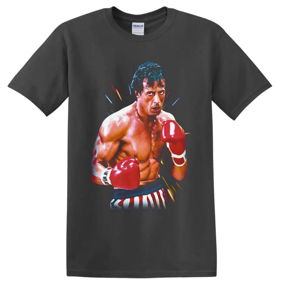 Rocky Balboa boxing portrait with red gloves, striped trunks, and colorful action streaks on a Charcoal T Shirt