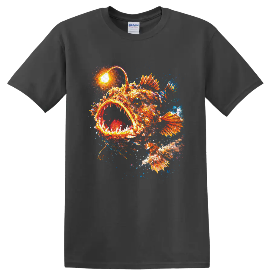 Glowing orange anglerfish with toothy mouth and colorful deep-sea paint splash art on a Charcoal T Shirt