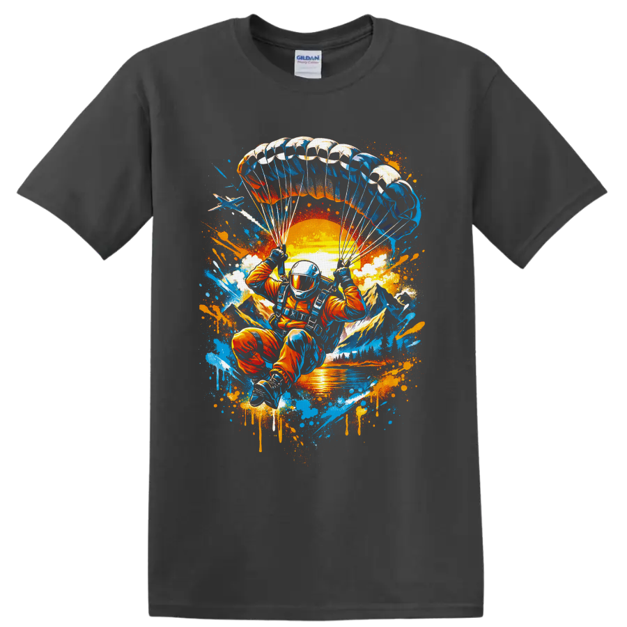 Skydiver under parachute over sunset mountains in vibrant graffiti splatter art on a Charcoal T Shirt