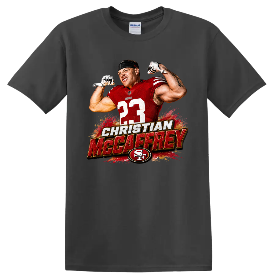 Christian McCaffrey flexing in 49ers number 23 jersey with bold name graphic on a Charcoal T Shirt