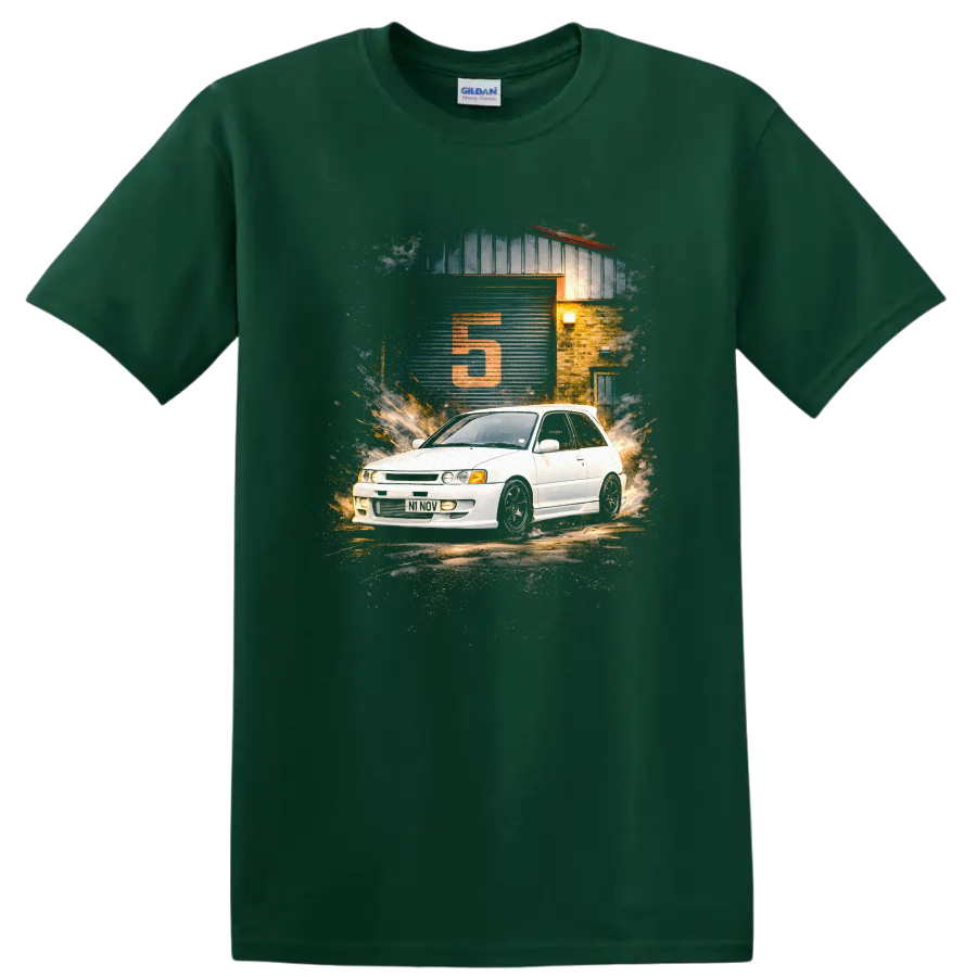 Toyota Starlet GT Turbo graphic print with white hatchback and garage scene on a Forest Green T Shirt