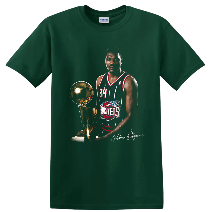 Hakeem Olajuwon in Houston Rockets No. 34 uniform beside championship trophy on a Forest Green T Shirt
