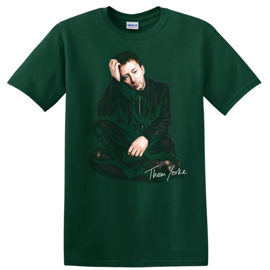 Thom Yorke seated portrait with handwritten signature, dark alternative rock style on a Forest Green T Shirt
