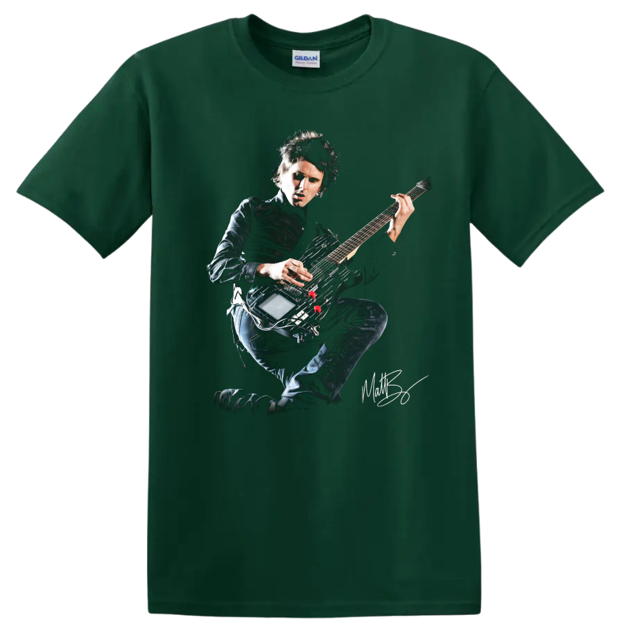 Matt Bellamy of Muse playing electric guitar in a dramatic rock portrait on a Forest Green T Shirt