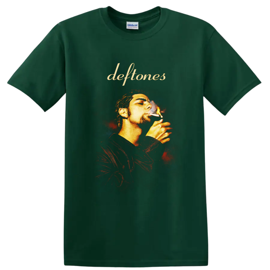 Deftones script above Chino Moreno smoking portrait with fiery smoky background on a Forest Green T Shirt