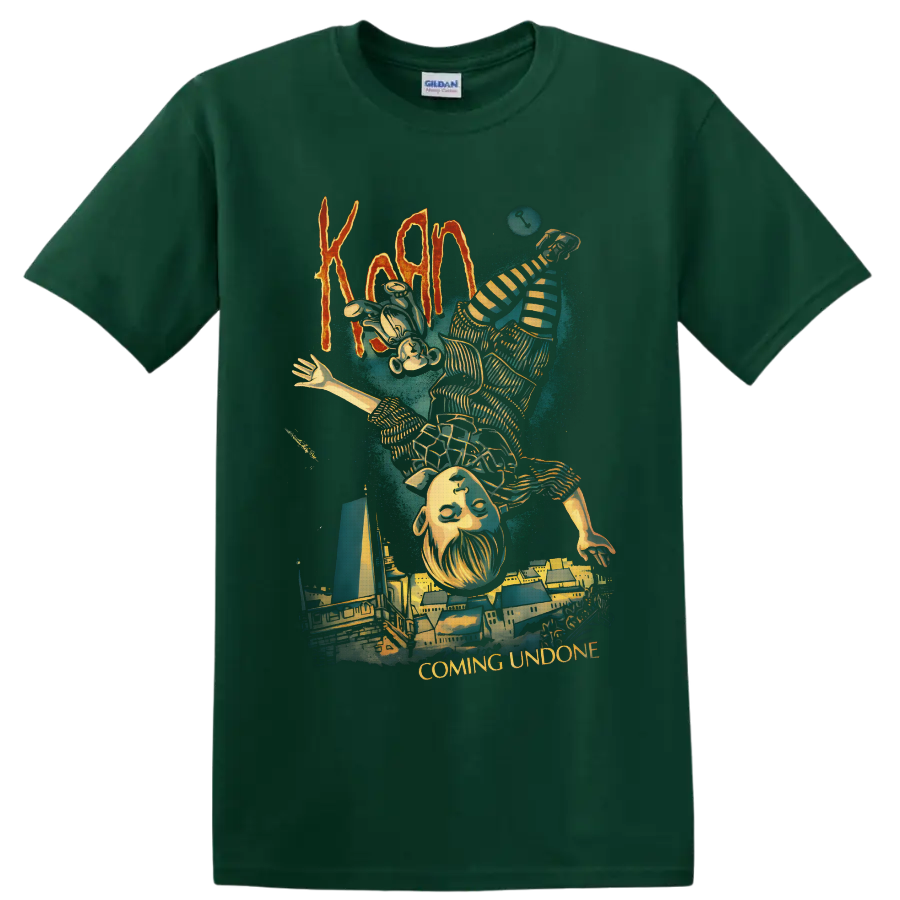 Korn Coming Undone art with upside-down striped figure and surreal cityscape on a Forest Green T Shirt