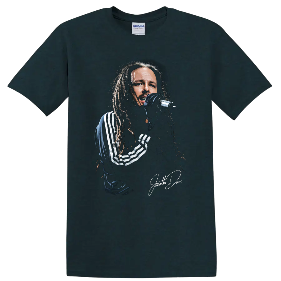 Jonathan Davis of Korn performing with a microphone in gritty portrait artwork on a Midnight (Green) T Shirt