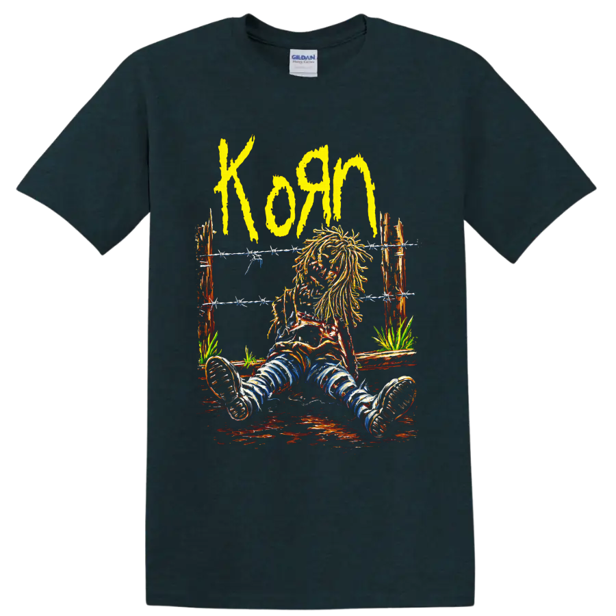 Korn yellow wordmark and seated long-haired figure behind barbed wire on a Midnight (Green) T Shirt