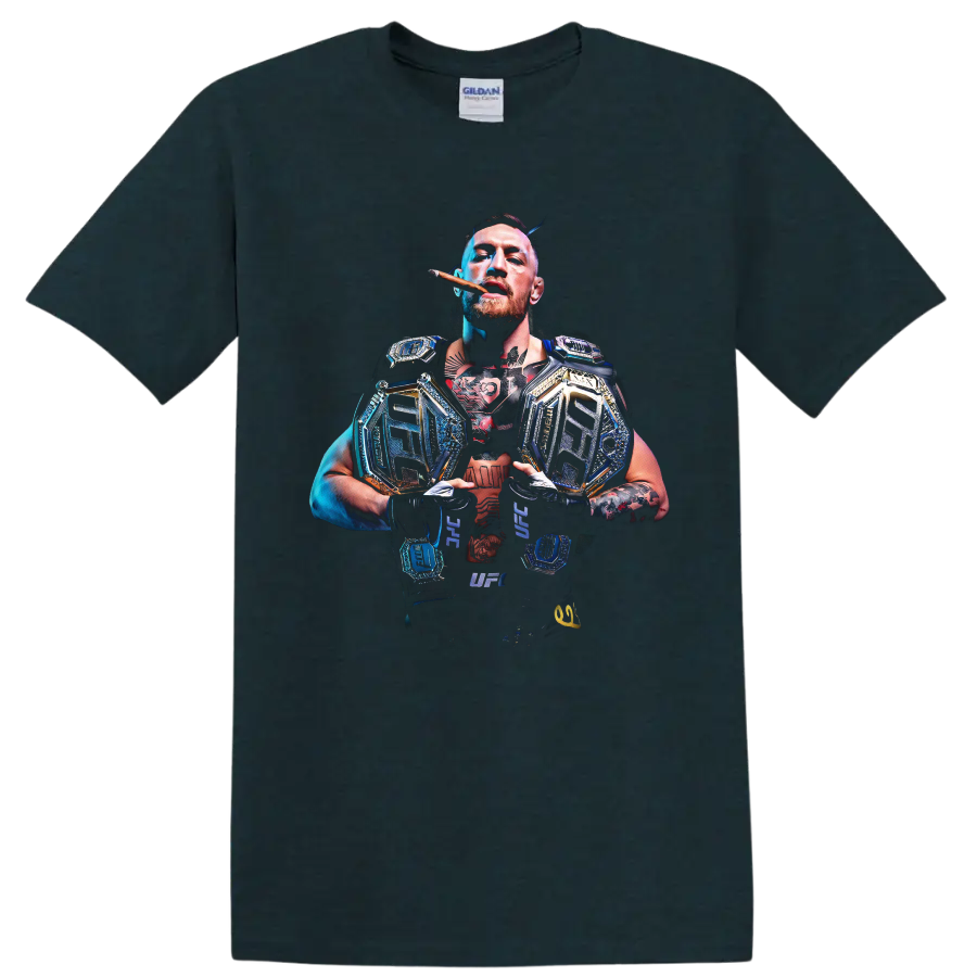 Conor McGregor with championship belts in a dramatic blue-and-gold MMA portrait on a Midnight (Green) T Shirt