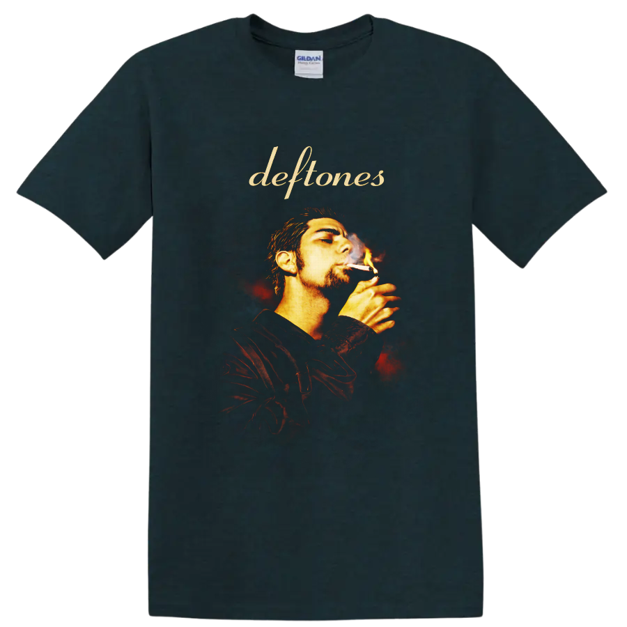 Deftones script above Chino Moreno smoking portrait with fiery smoky background on a Midnight (Green) T Shirt