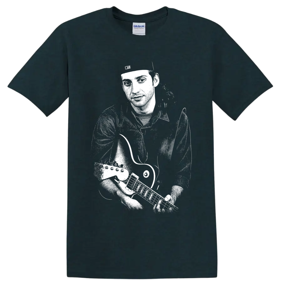 High-contrast monochrome portrait of Stone Gossard playing guitar on a Midnight (Green) T Shirt