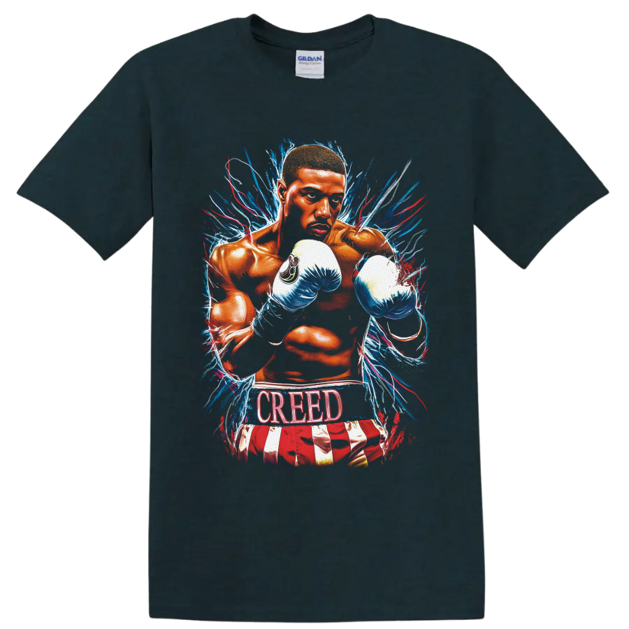 Adonis Creed boxing illustration with blue gloves, paint bursts, and CREED text on a Midnight (Green) T Shirt