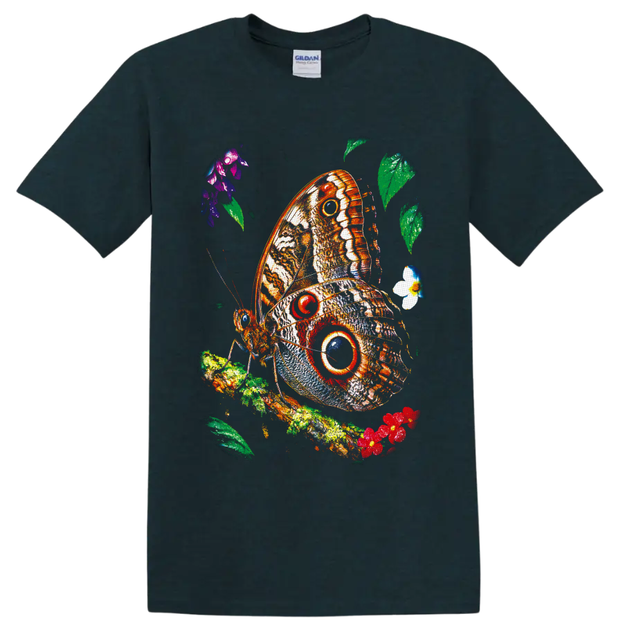 Colorful owl butterfly with bold eyespots on a leafy flowering branch on a Midnight (Green) T Shirt