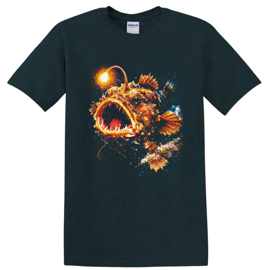 Glowing orange anglerfish with toothy mouth and colorful deep-sea paint splash art on a Midnight (Green) T Shirt