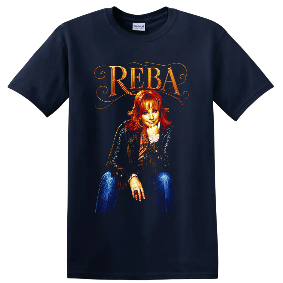 Reba McEntire portrait with ornate REBA lettering, fringe jacket, and vivid western art on a Navy (Blue) T Shirt